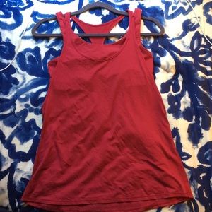 Berry colored lululemon tank with built in bra